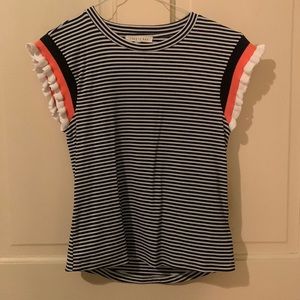 navy and white striped shirt with orange and white ruffle sleeves